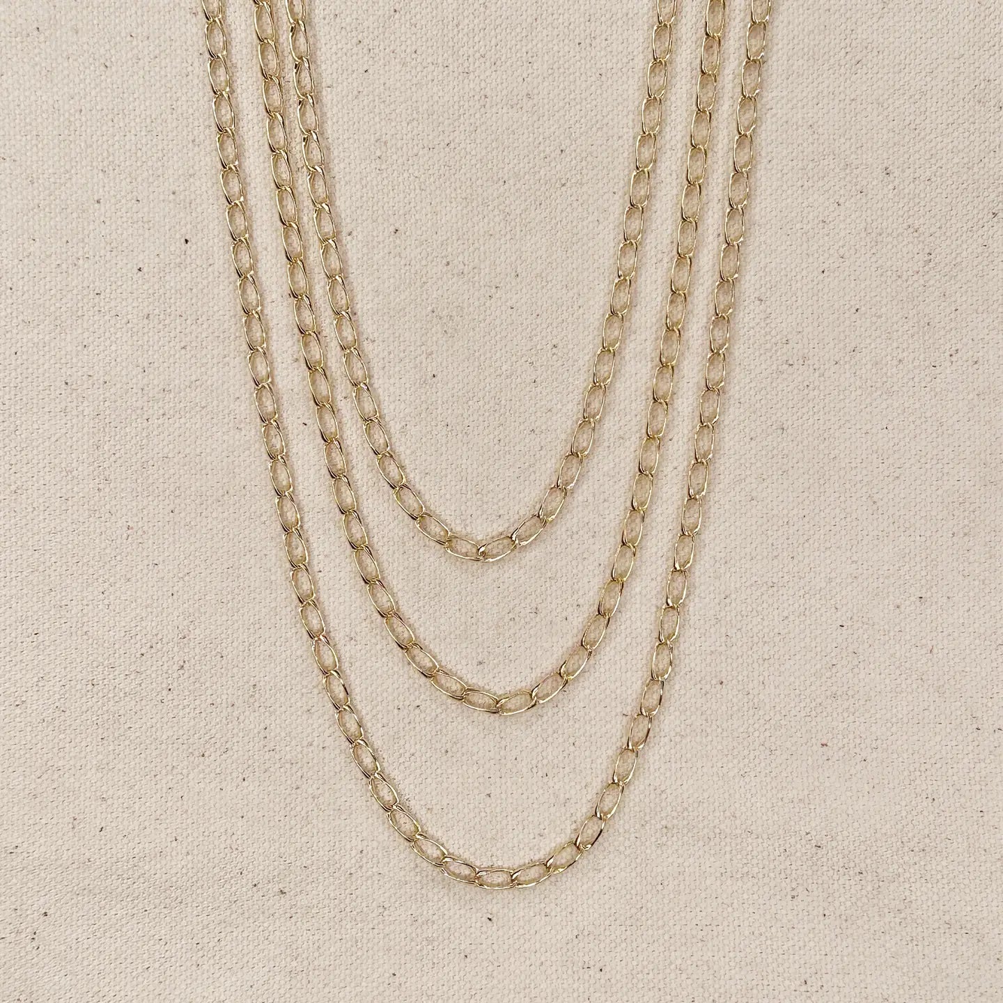 TWIST LINK CHARM NECKLACE