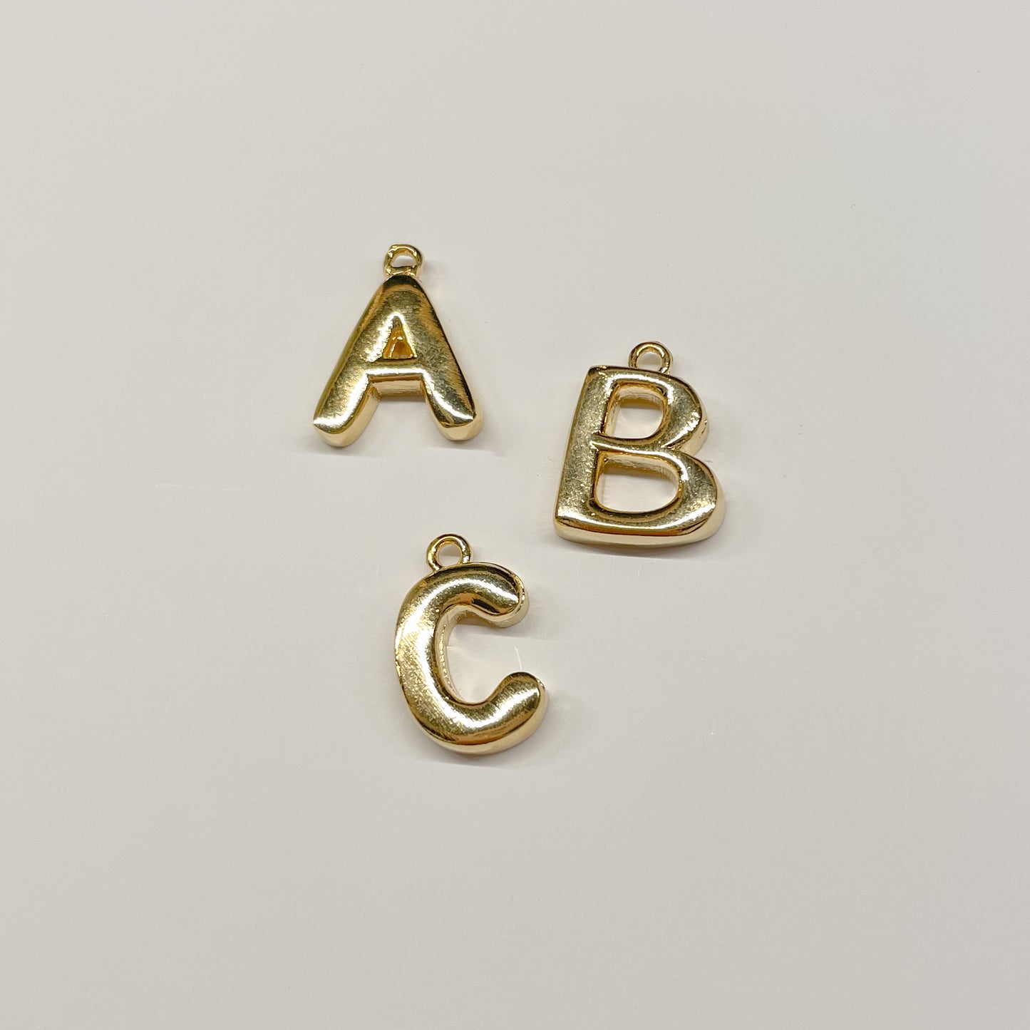 BUBBLE LETTER CHARM