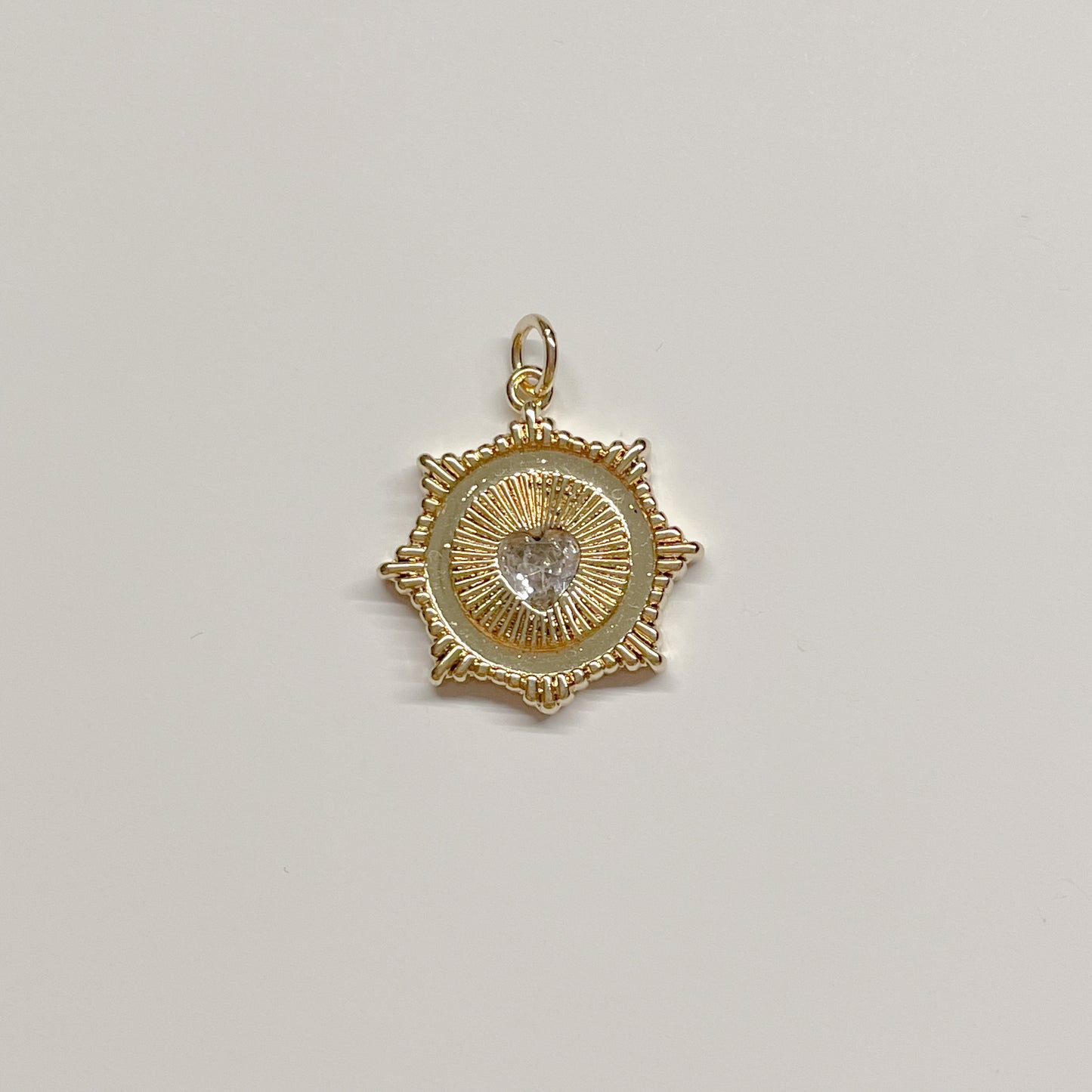 HEART SUNBURST CHARM
