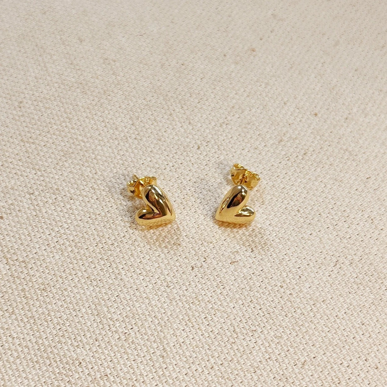 MINI UNEVEN HEART STUD EARRINGS