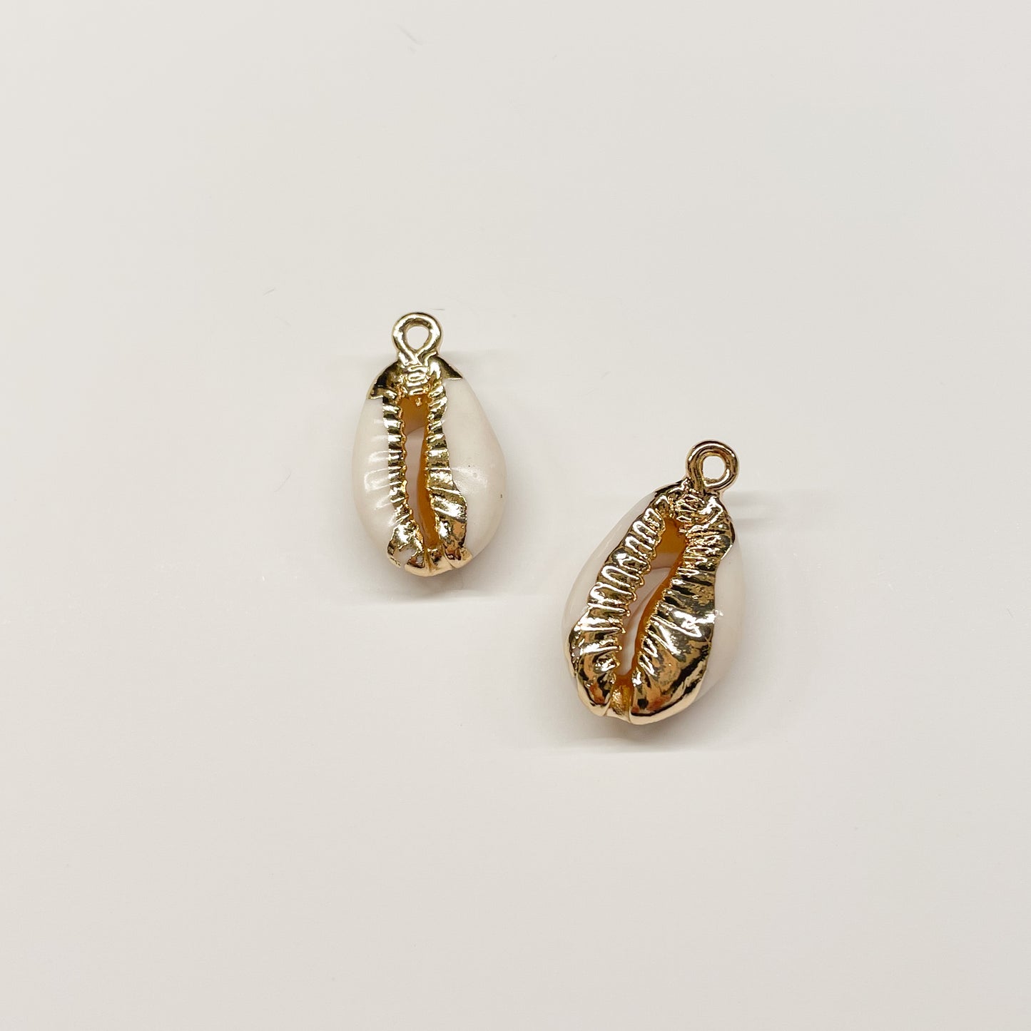 COWRIE SHELL CHARM