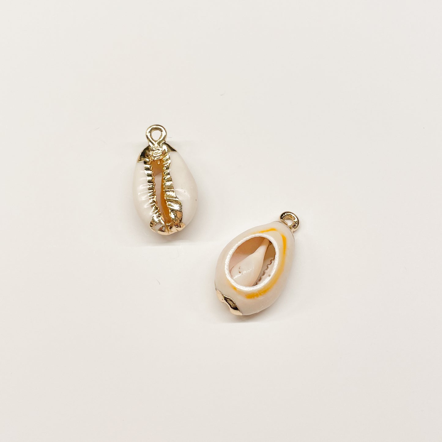 COWRIE SHELL CHARM